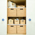Cupboard with custom sized baskets in natural